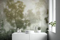 Foggy woodland wallpaper mural in muted green tones
