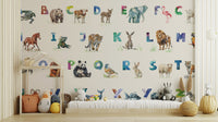 Playful alphabet-themed wallpaper with a menagerie of animal illustrations.