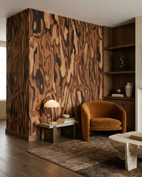 Nutmeg and sand loops warm a living room paired with the Ettore burl wall mural.