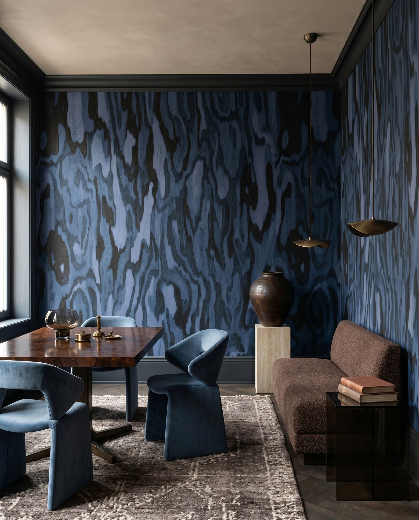 Dining corner takes on navy currents from the Ettore Burl wall mural.