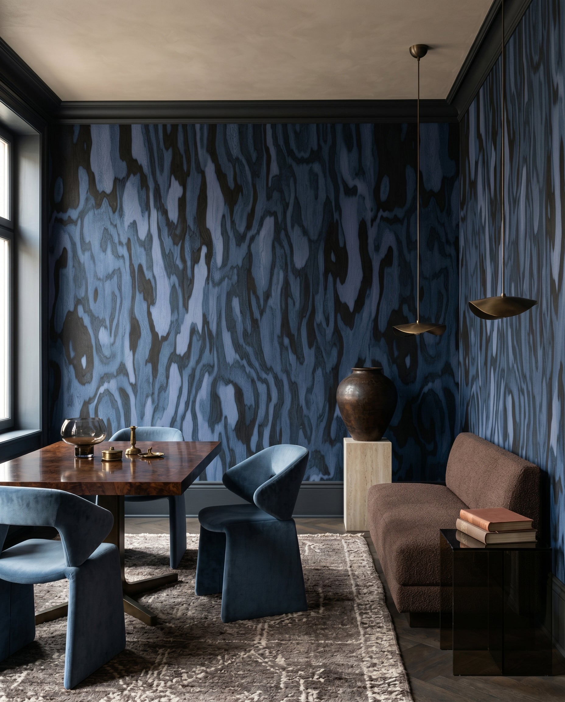 Dining corner takes on navy currents from the Ettore Burl wall mural.