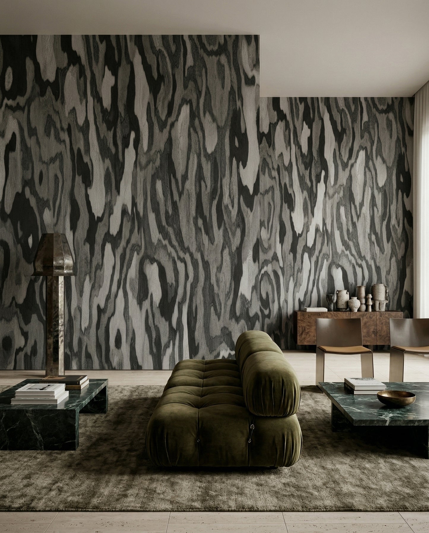 Silver and graphite tones lift a Living area via this marbled wall mural.