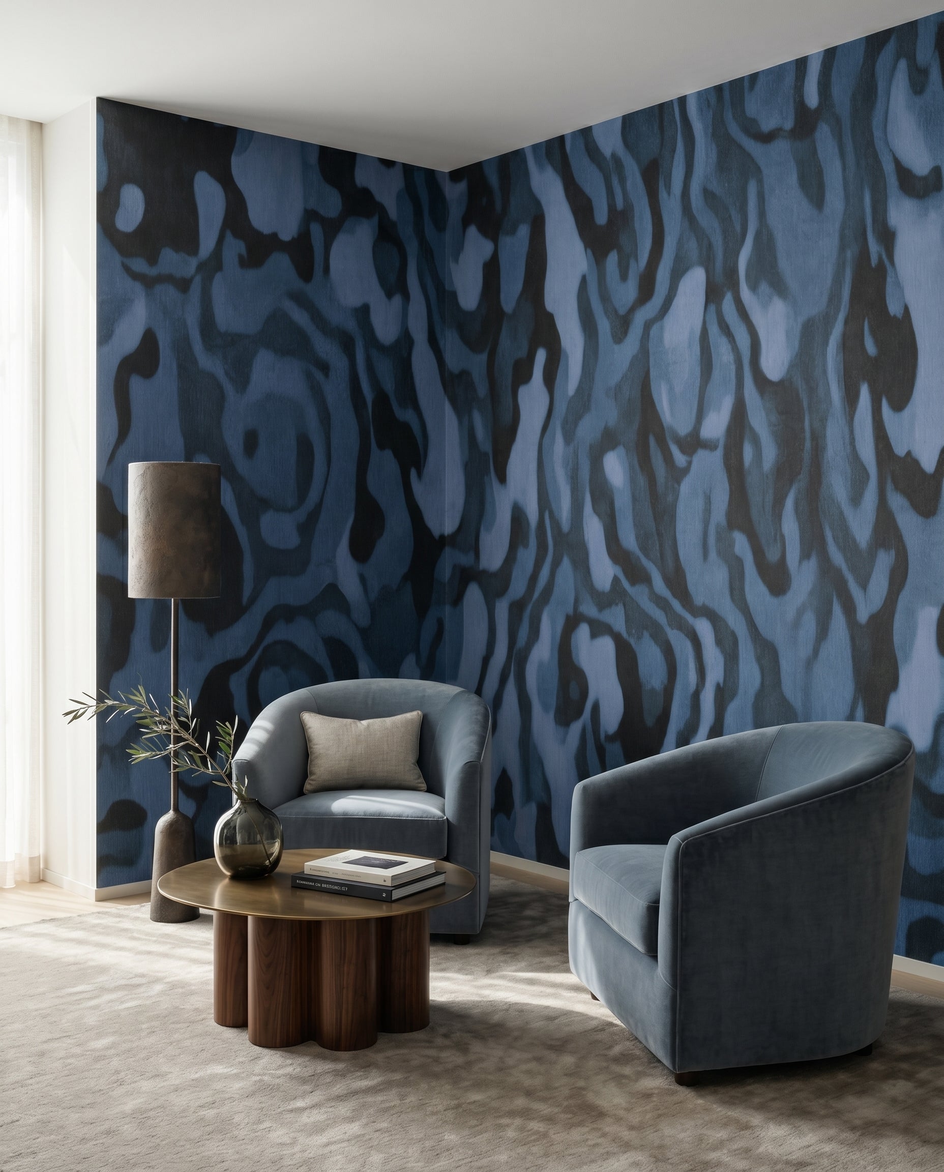 Midnight blue marbling spreads through a calm living room on the Ettore Veins wall mural.