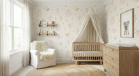 Cream Baby Forest Friends wallpaper of line-drawn woodland animals in a nursery with wood crib and white glider