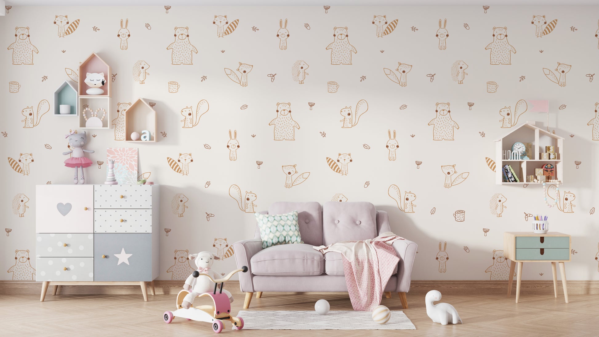 Cream Baby Forest Friends wallpaper with sketched animals above a dusty pink loveseat in a pastel kids room
