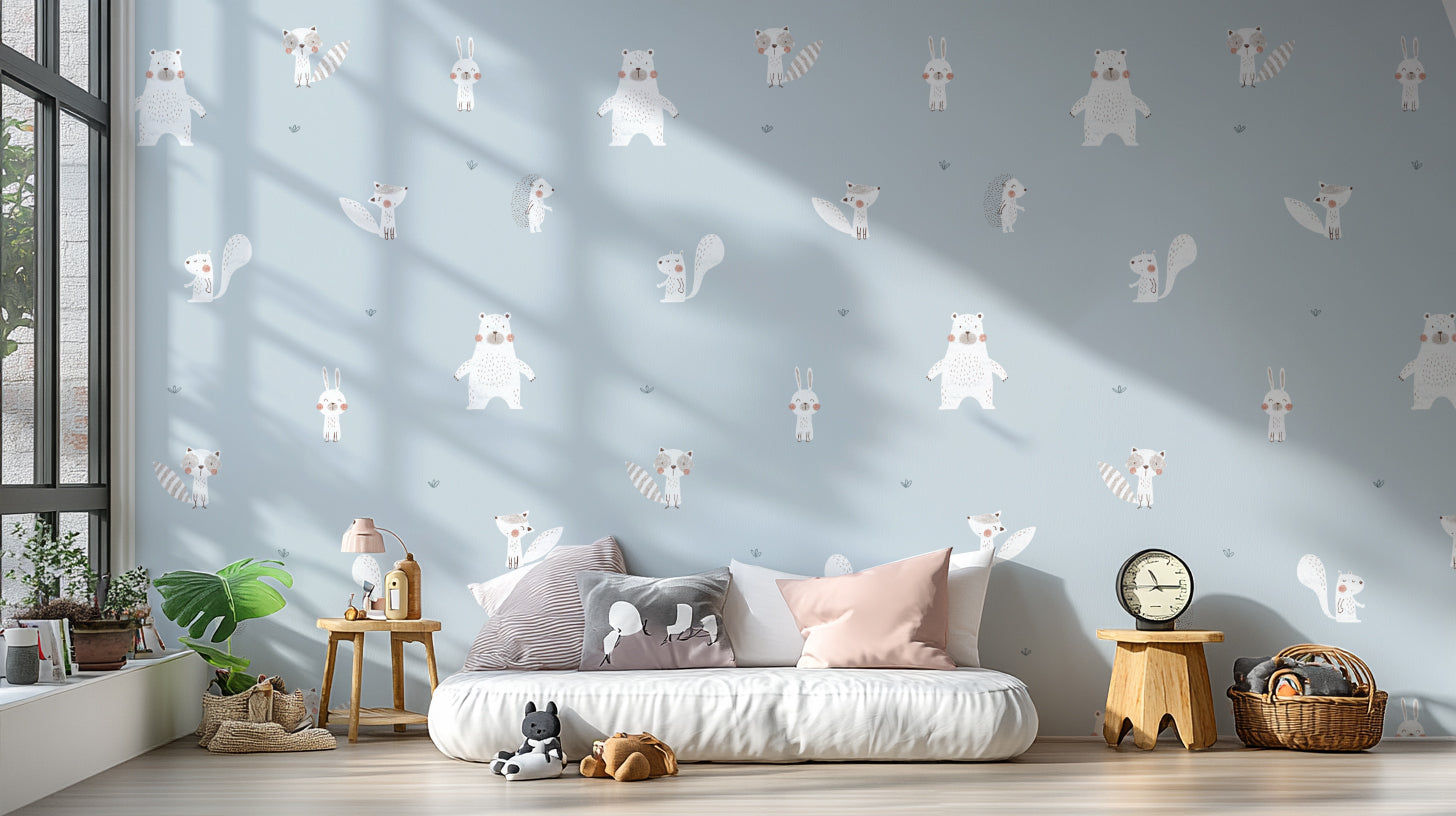 Forest Animals Blue wallpaper of woodland animals above a low white daybed with pink cushions in a blue room