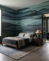 Roerich Hills wall mural lifts a calm bedroom with teal ridges fading into pale fog.