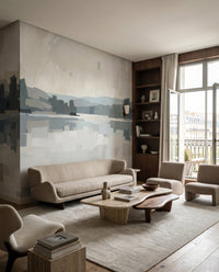 Painterly lake view sits in a lounge under the Glow wall mural piece.