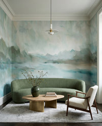 Living room set against the calm horizon line in the Velvet Horizon wall mural