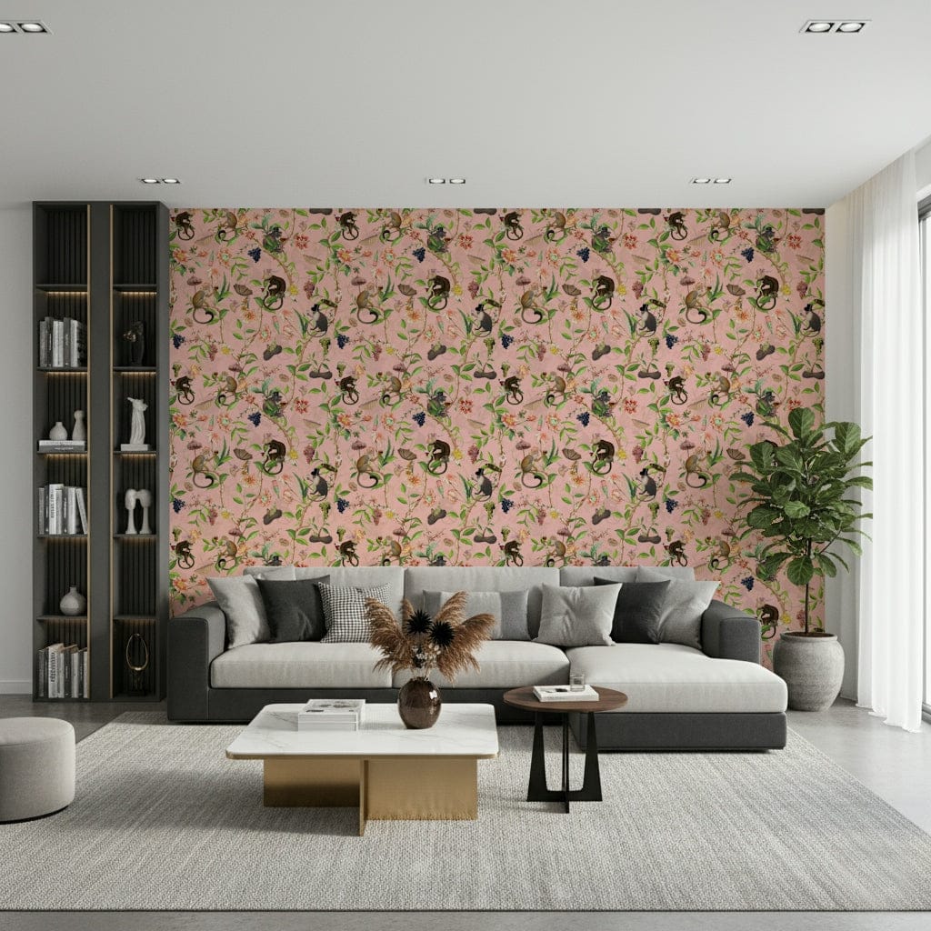 A Primate's Garden Party pink wallpaper behind a grey sectional sofa and tall black bookshelf