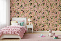 A Primate's Garden Party wallpaper in blush pink with monkeys and florals in a pink girls bedroom
