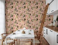 A Primate's Garden Party wallpaper of monkeys and florals in a kitchen nook with marble table and ladder