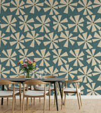 Abstract floral radiance wallpaper featuring starburst flower shapes on a teal background.
