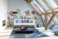 Abstract Flower wallpaper mural of peach poppies on mint in an attic lounge with a white pallet sofa