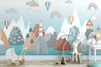 Abstract Mountain with Sea wallpaper in soft blue behind a wooden toy pram in a childs playroom