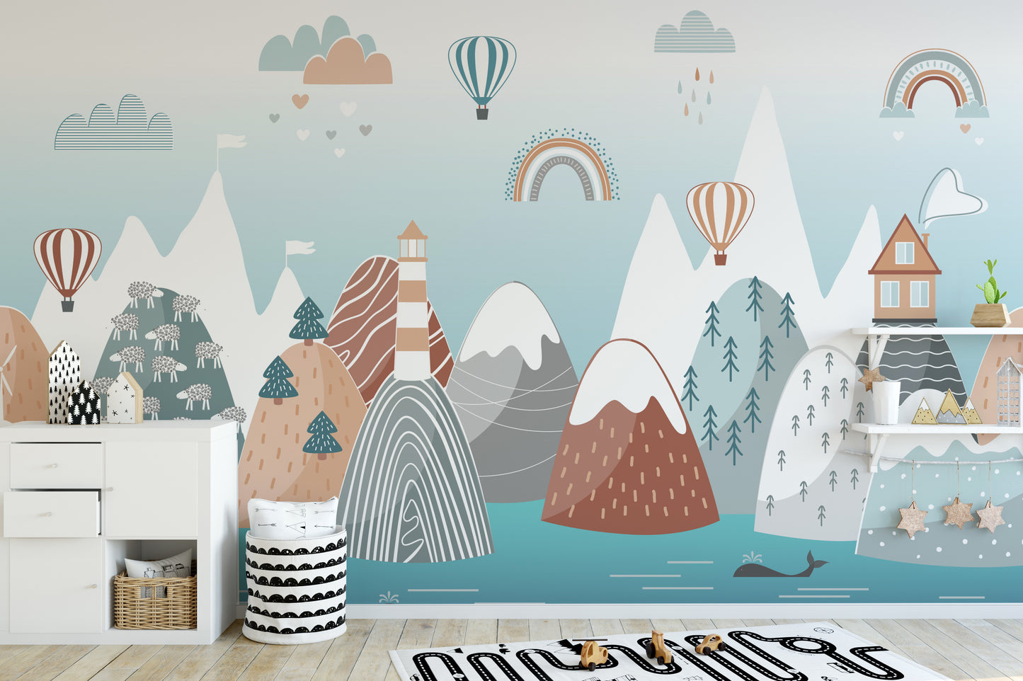 Abstract Mountain with Sea wallpaper with balloons and a whale beside a white dresser in a nursery