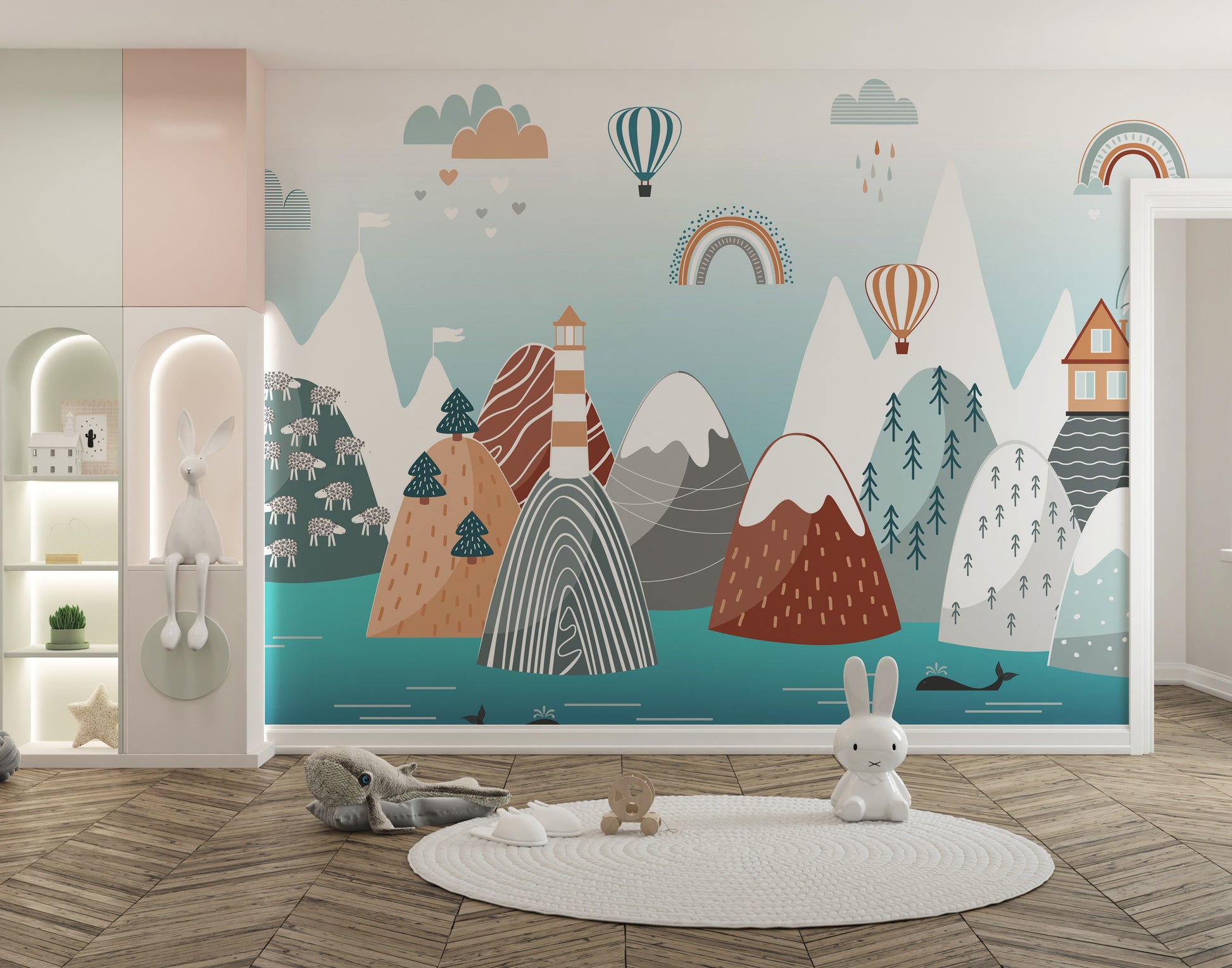 Abstract Mountain with Sea wallpaper in pastel teal with rainbows above a round rug and bunny toys in a nursery