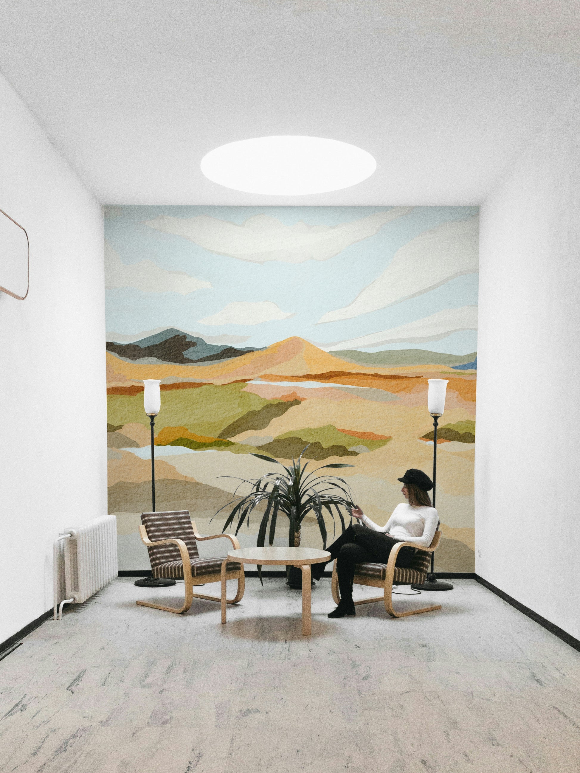 Modern abstract mural depicting mountain landscape

