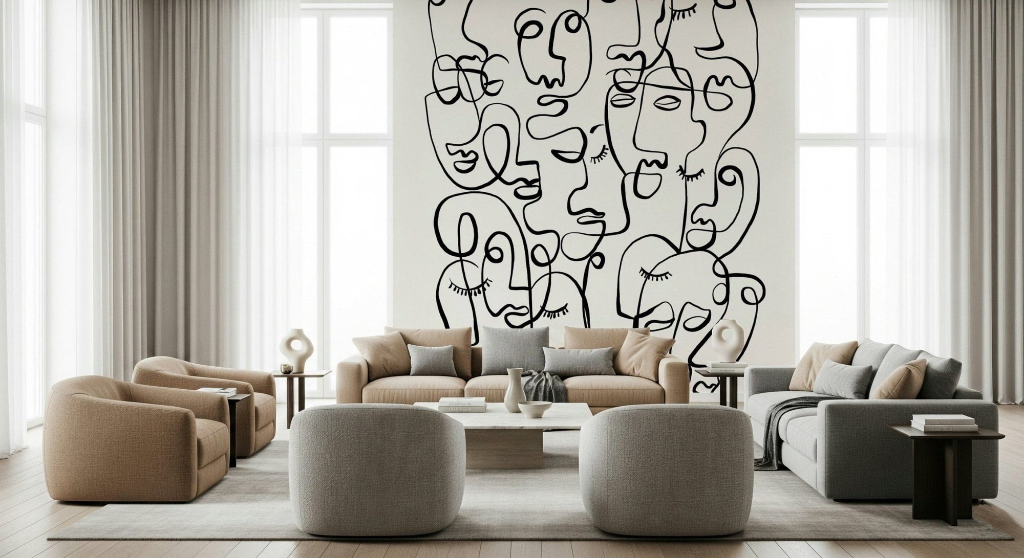 Abstract Portraits wallpaper mural of black line-art faces behind tan and grey sofas in a living room