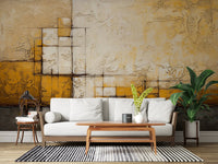 Abstract Texture wallpaper mural of yellow and beige textured squares behind a white sofa and wood bench table in a living room