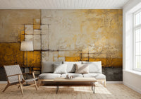 Abstract Texture wallpaper mural of mustard and cream textured blocks behind a white sofa and woven leather chair in a living room