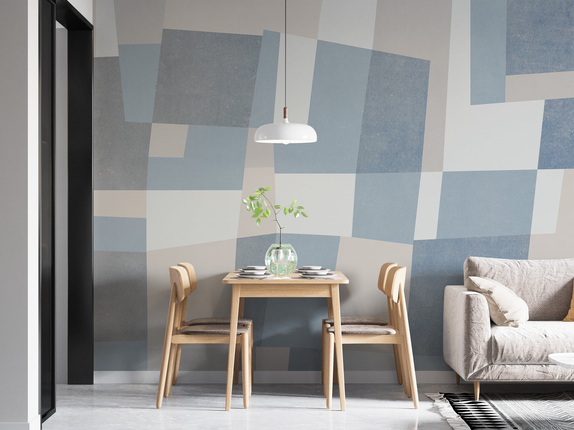 Abstract Cubist wallpaper mural of blue and grey blocks in a dining nook with wooden table and chairs