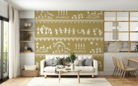 Adivasi Chronicles wall mural with white folk-art dancers and villagers on mustard behind a white sofa in a living room