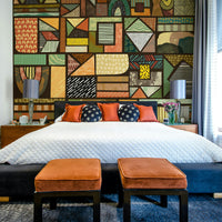 Africa-inspired mural with wildlife, savannas, and rich landscapes.

