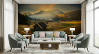 Scenic wall mural with an alpine cabin surrounded by mountains and morning light.
