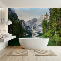 Alpine Reflections wallpaper mural of the lake and Dolomite peaks behind a freestanding white bathtub in a bathroom