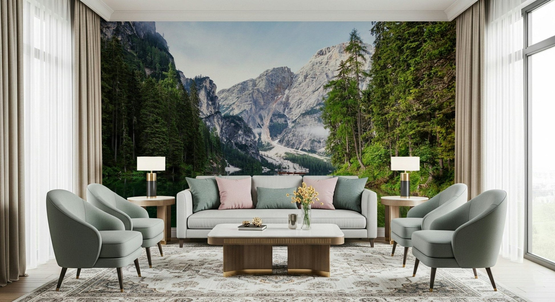 Alpine Reflections wallpaper mural of the mountain lake behind a pale grey-green sofa and armchairs in a living room