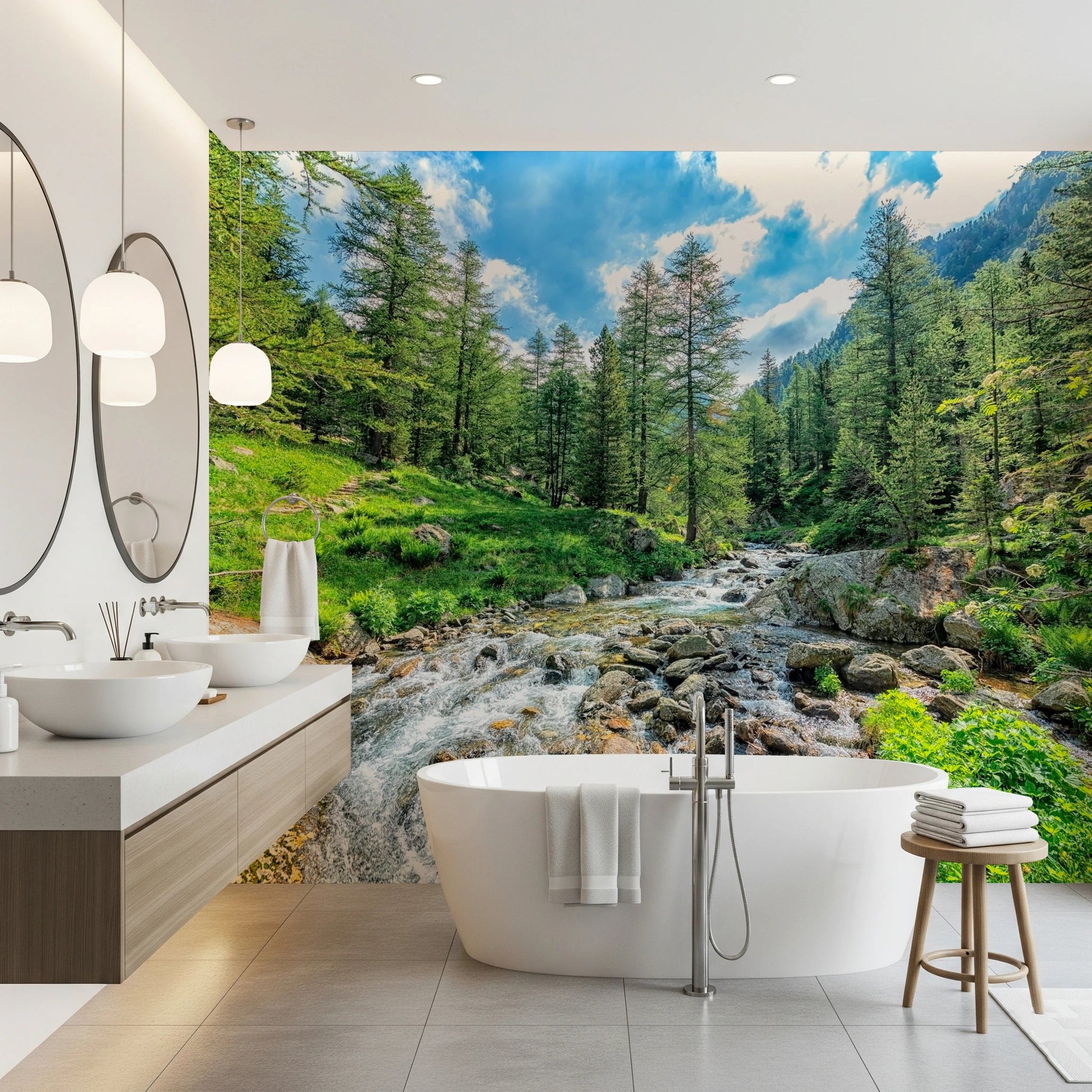 Alpine Stream wallpaper mural of a rushing forest creek in a bathroom with floating wood vanity and freestanding tub