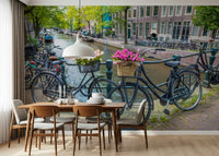 Amsterdam Blooms on Wheels attractive canal side scene cycling artistry.