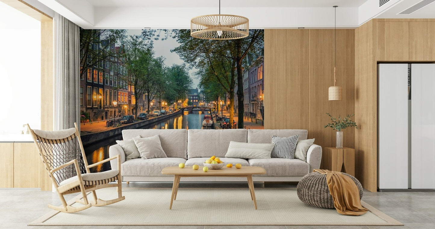 Amsterdam Canal Lights wallpaper mural of an evening canal behind a cream sofa and rocking chair in a living room