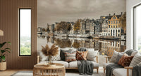 Living room wall mural of Amsterdam houses mirrored in water, warm neutral tones