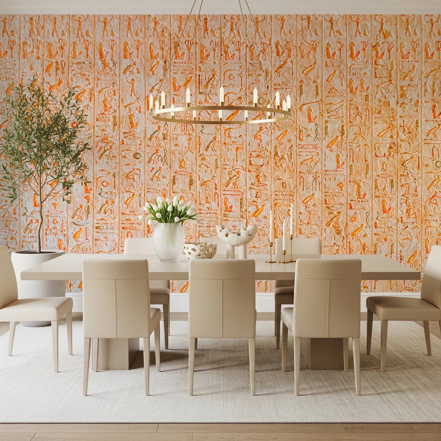 Ancient Inscriptions wallpaper mural in orange glyphs in an elegant dining room with beige chairs and a round chandelier