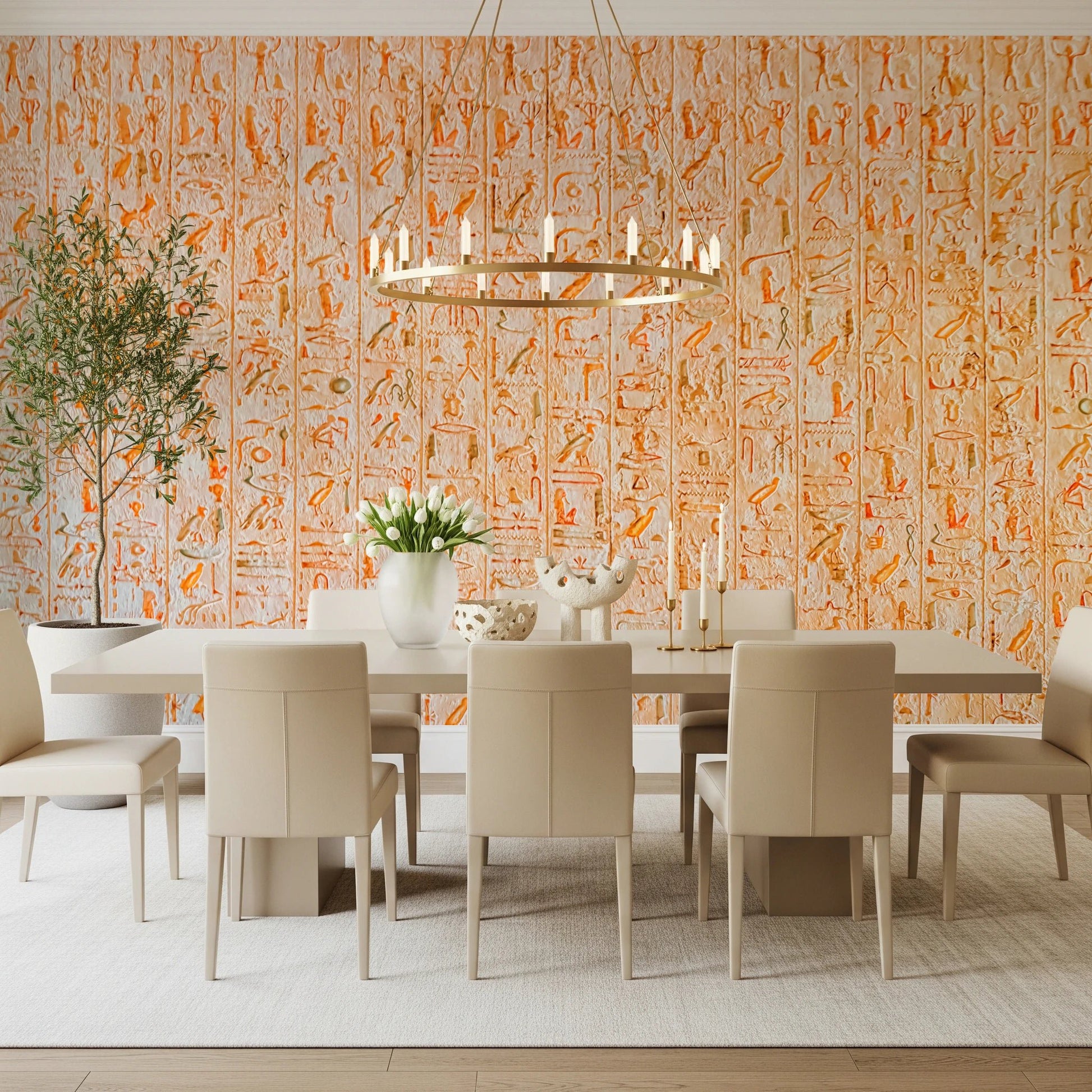 Ancient Inscriptions wallpaper mural in orange glyphs in an elegant dining room with beige chairs and a round chandelier