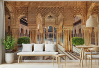 Andalusian Courtyard wallpaper mural displaying ornate carved stone pillars.