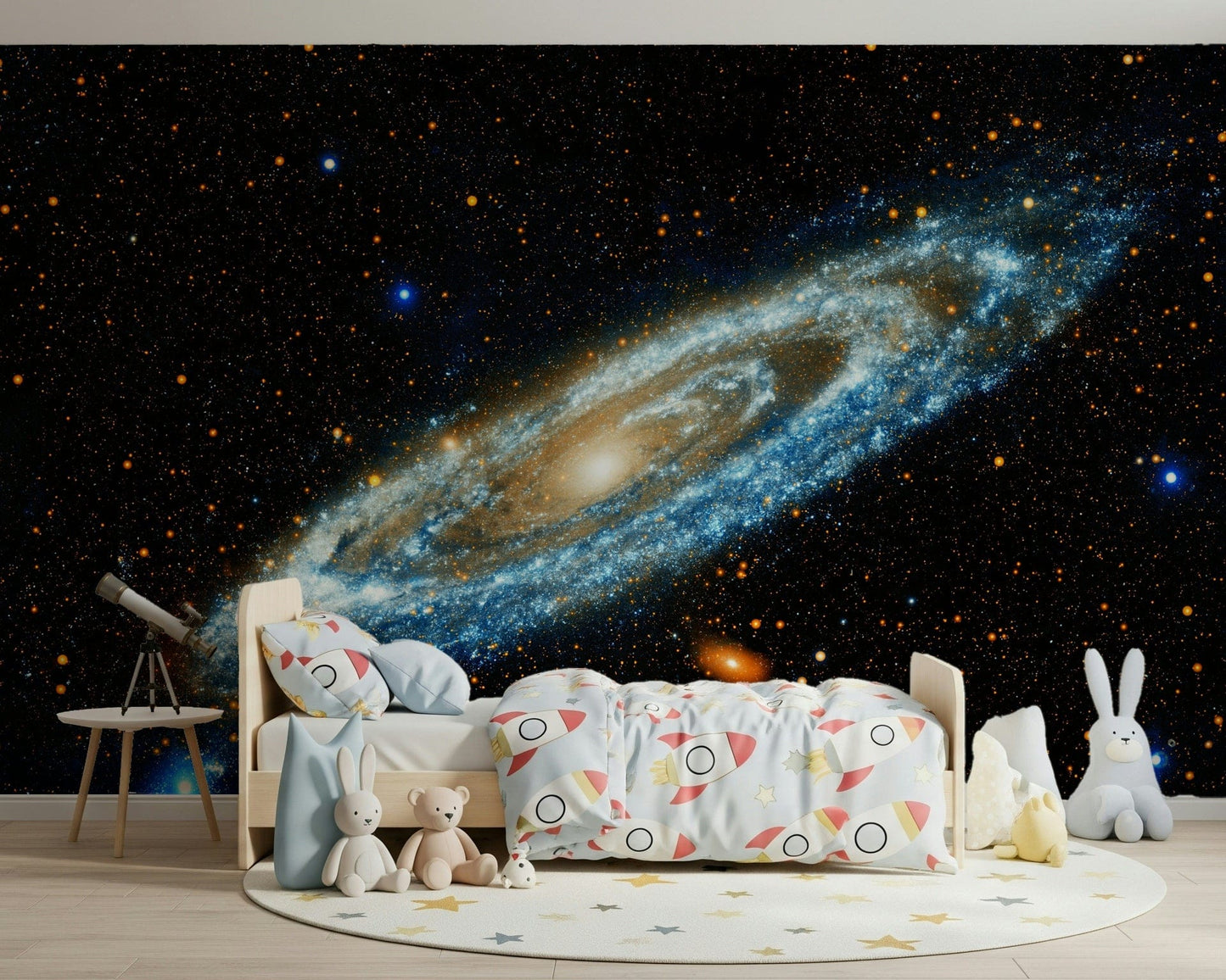 Andromeda mural of a spiral galaxy on starry black behind a kids bed and telescope in a space bedroom