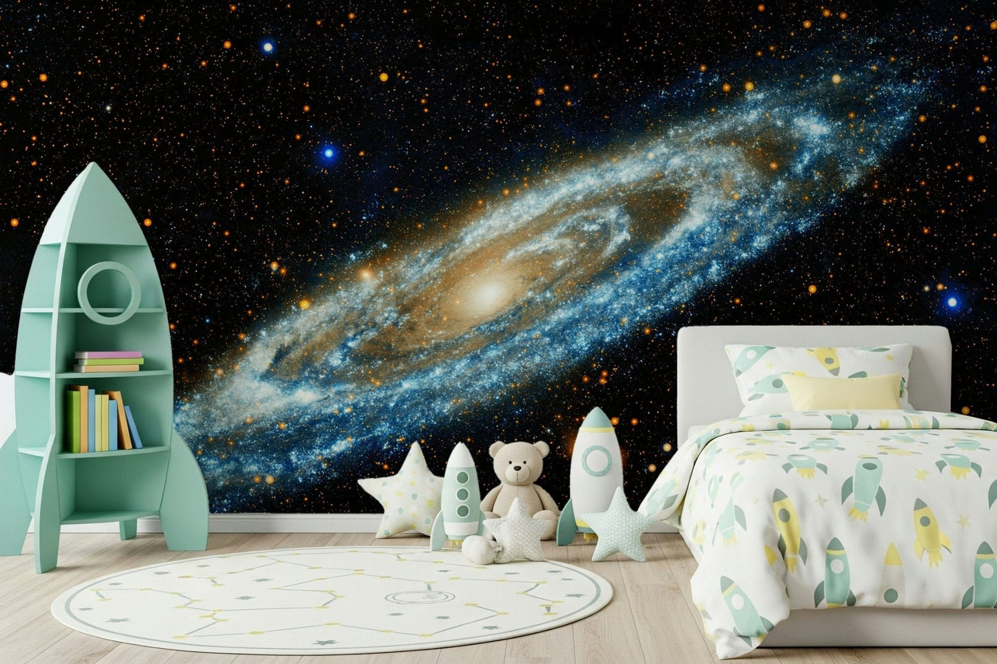 Andromeda galaxy mural on black beside a mint rocket bookshelf and white kids bed with rocket toys