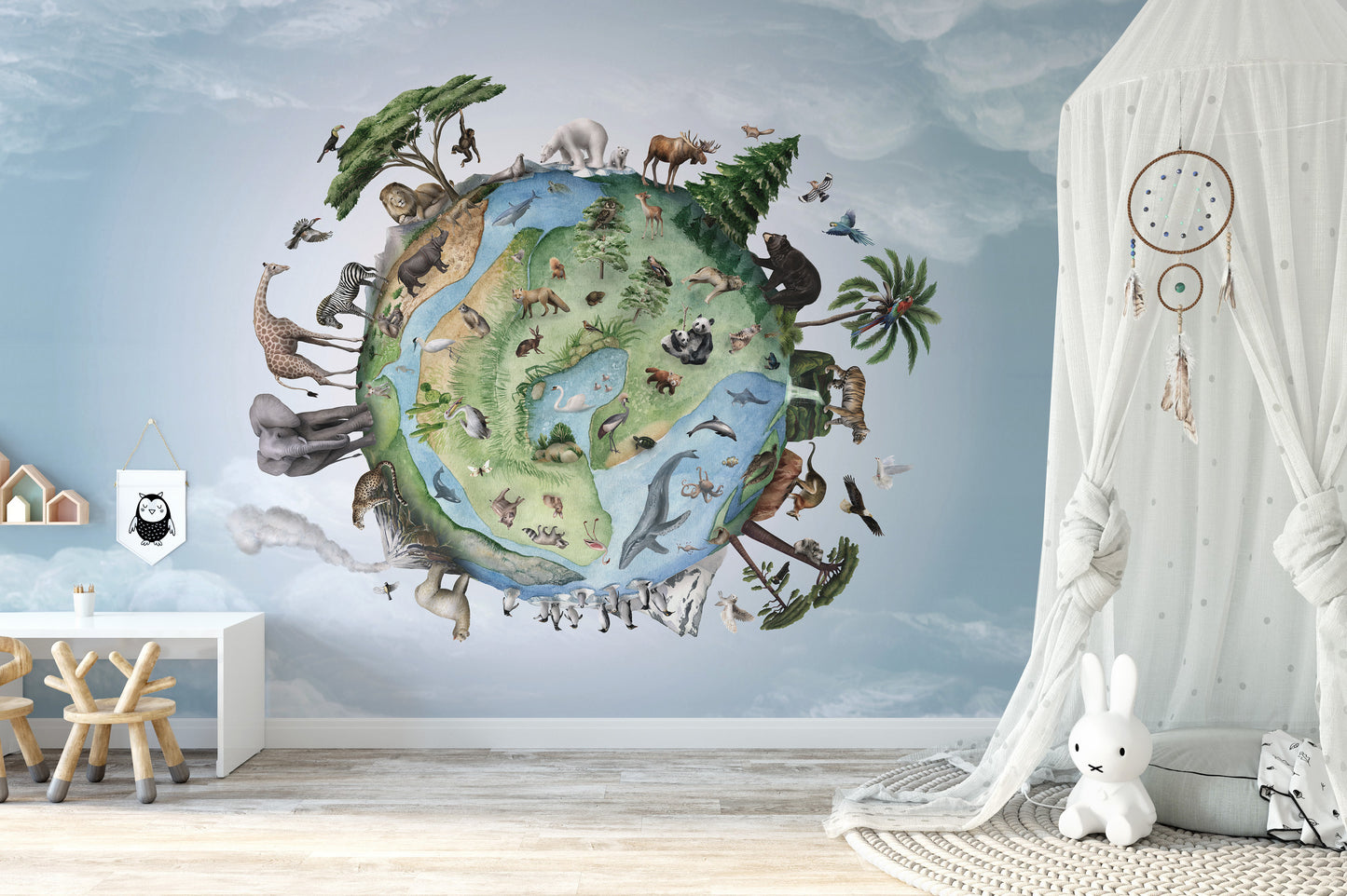 Animals Around Earth wallpaper showing a wildlife globe in blue sky by a canopy and bunny plush in a nursery