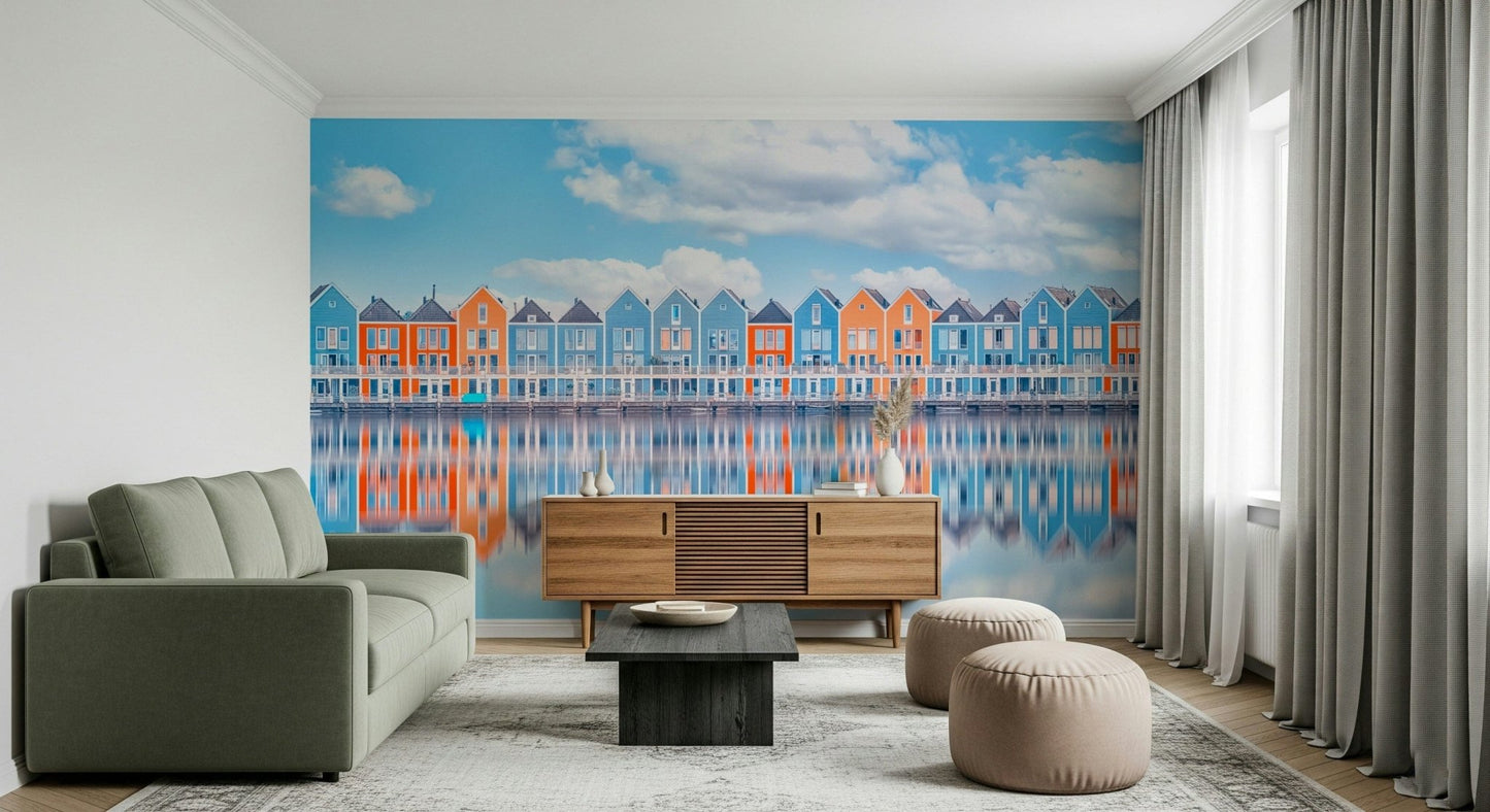 Coastal home wall mural with aqua cottage row and mirror-like water
