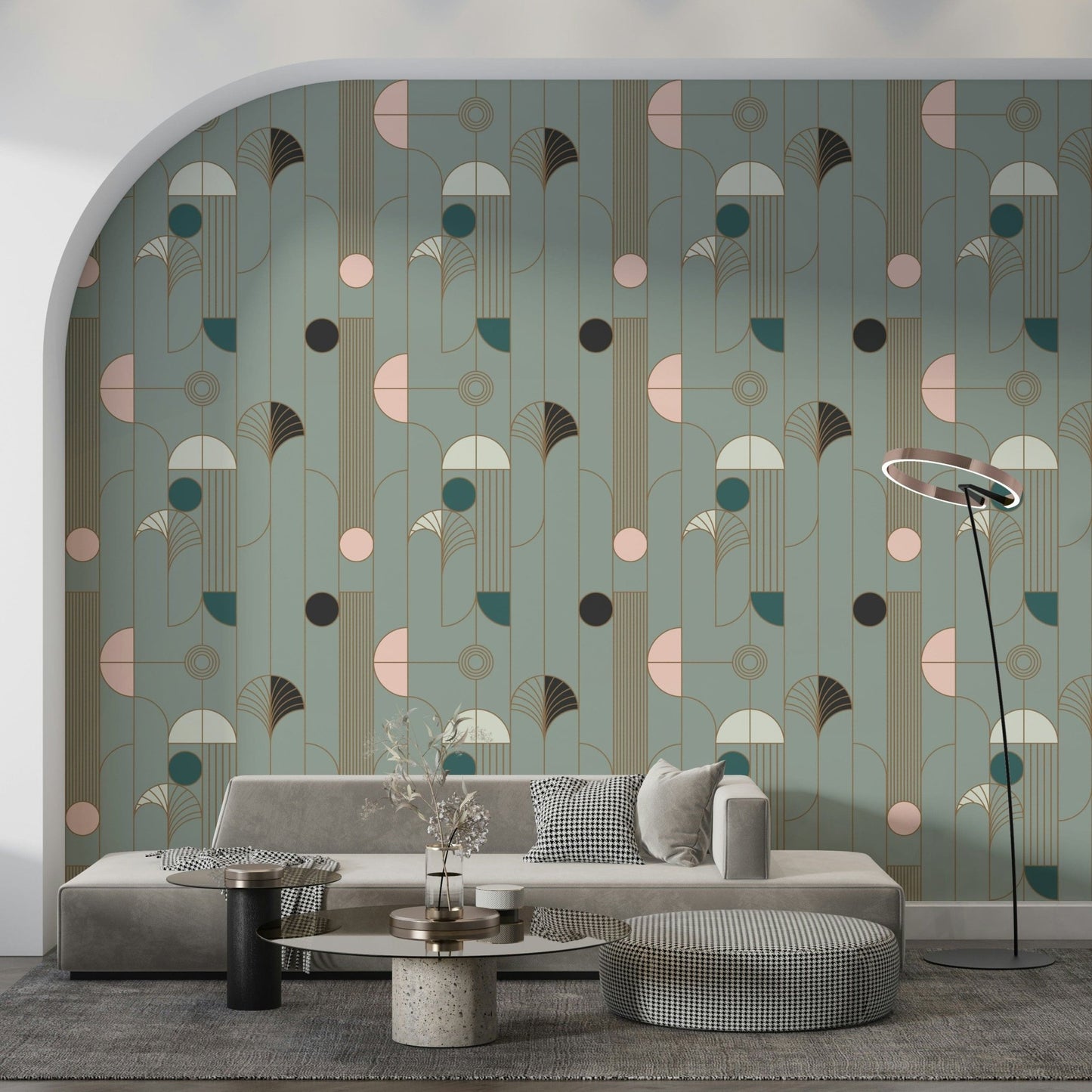 Art Deco Geometric Harmony wallpaper in sage deco shapes on an arch wall behind a grey sofa and houndstooth ottoman