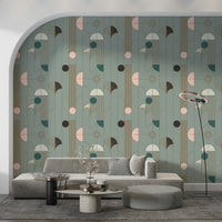 Art Deco Geometric Harmony wallpaper in sage deco shapes on an arch wall behind a grey sofa and houndstooth ottoman