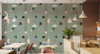 Art Deco Geometric Harmony wallpaper in sage and blush deco pattern in a cafe with pastel chairs and pastry counter