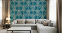 Ornate butterfly and plant design wallpaper, dark turquoise background.