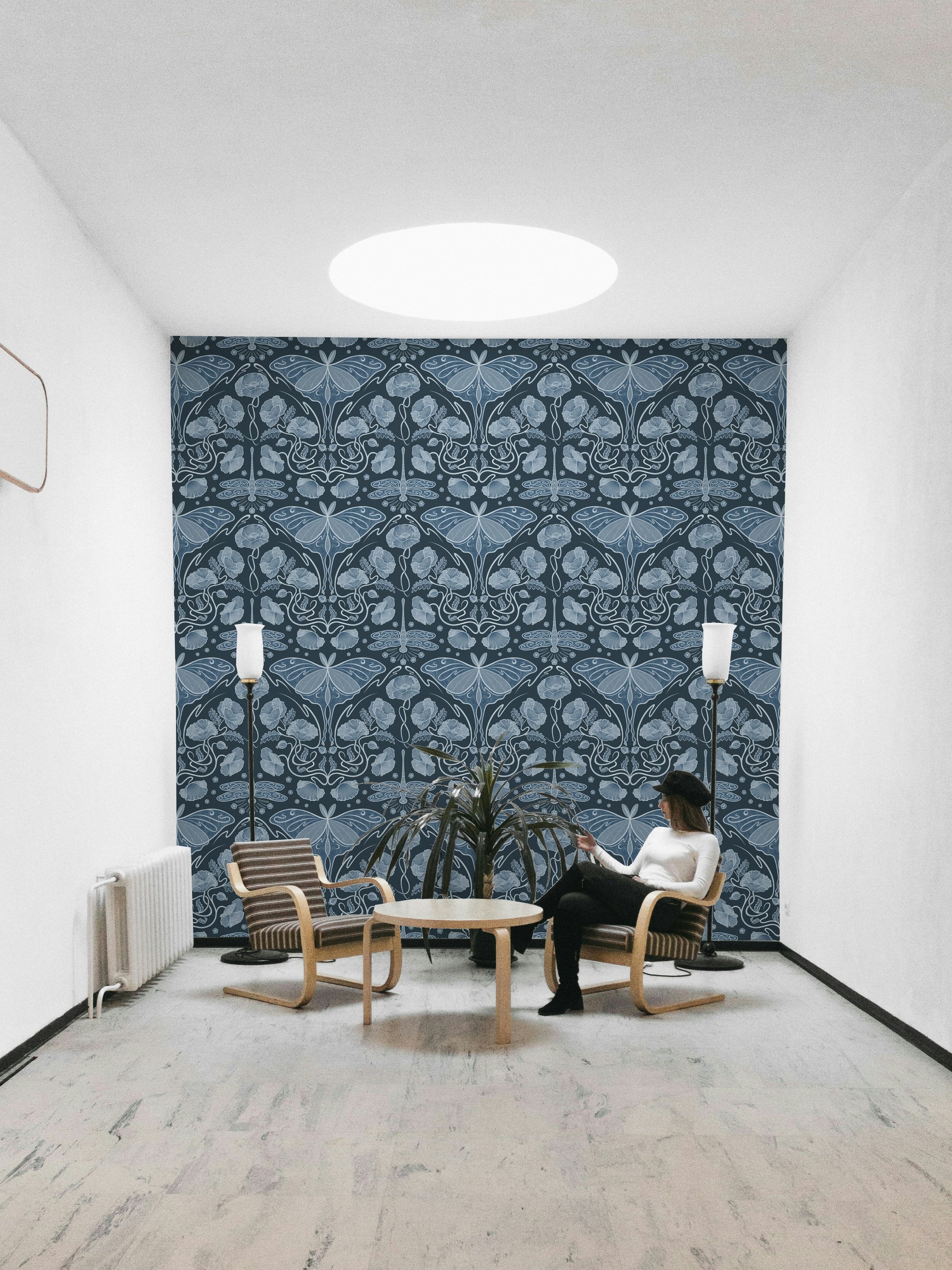 Blue background wallpaper with botanical art

