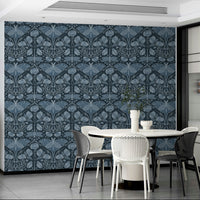 Elegant poppies and luna moth in soft blue

