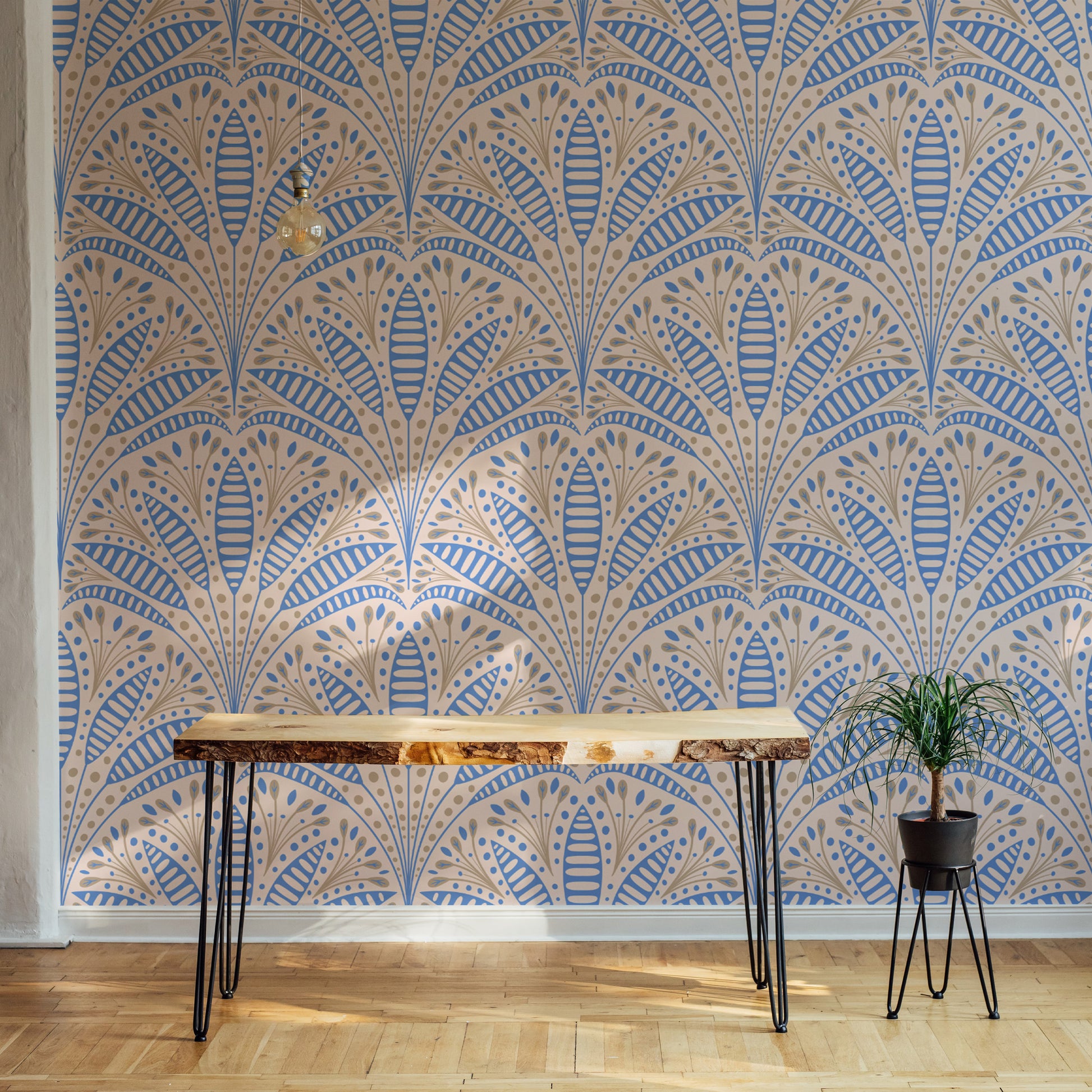 Standard Artdeco Blue Palm Wallpaper in a minimalist study room with a wooden desk and a small green plant.