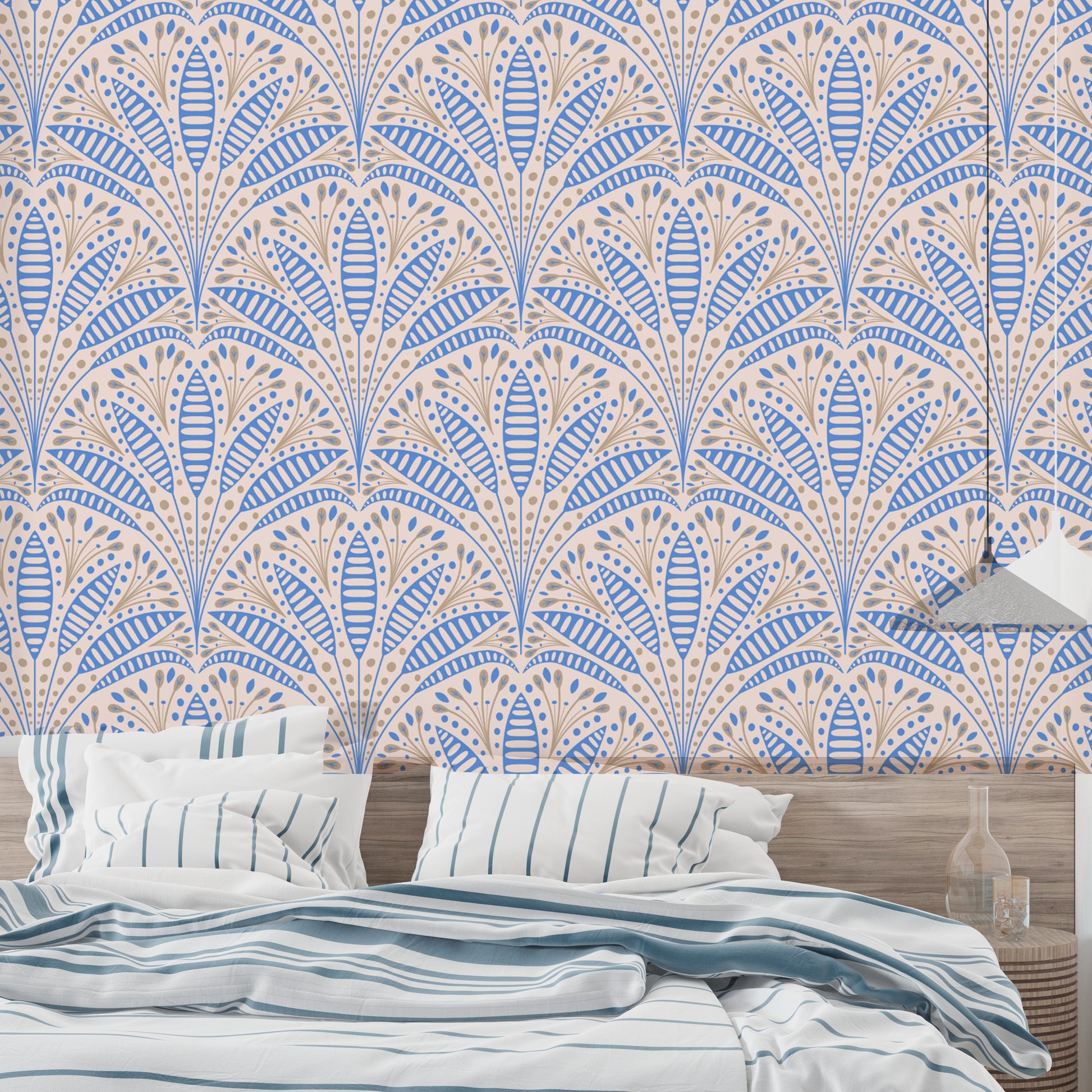 Luxury Artdeco Blue Palm Wallpaper in a bedroom with striped pillows using self adhesive backing for an easy update.